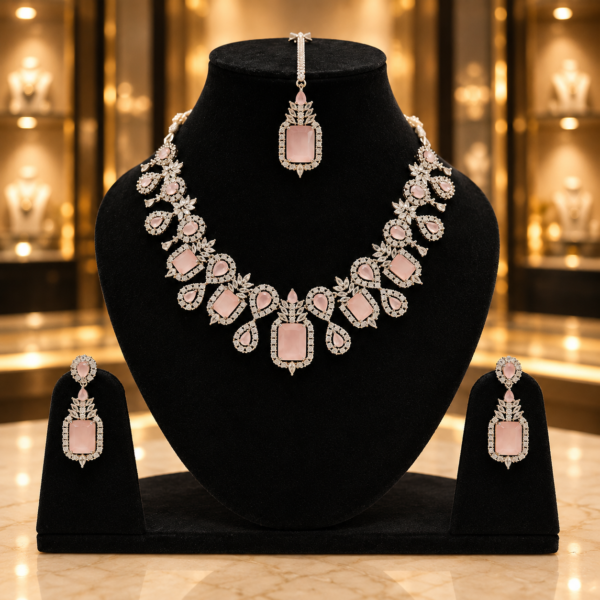 Blush pink floral necklace, matching earrings and maang tikka — studio product view